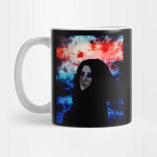 Beautiful girl with dark clothing and hair on dark blue and red clouds background. Mug